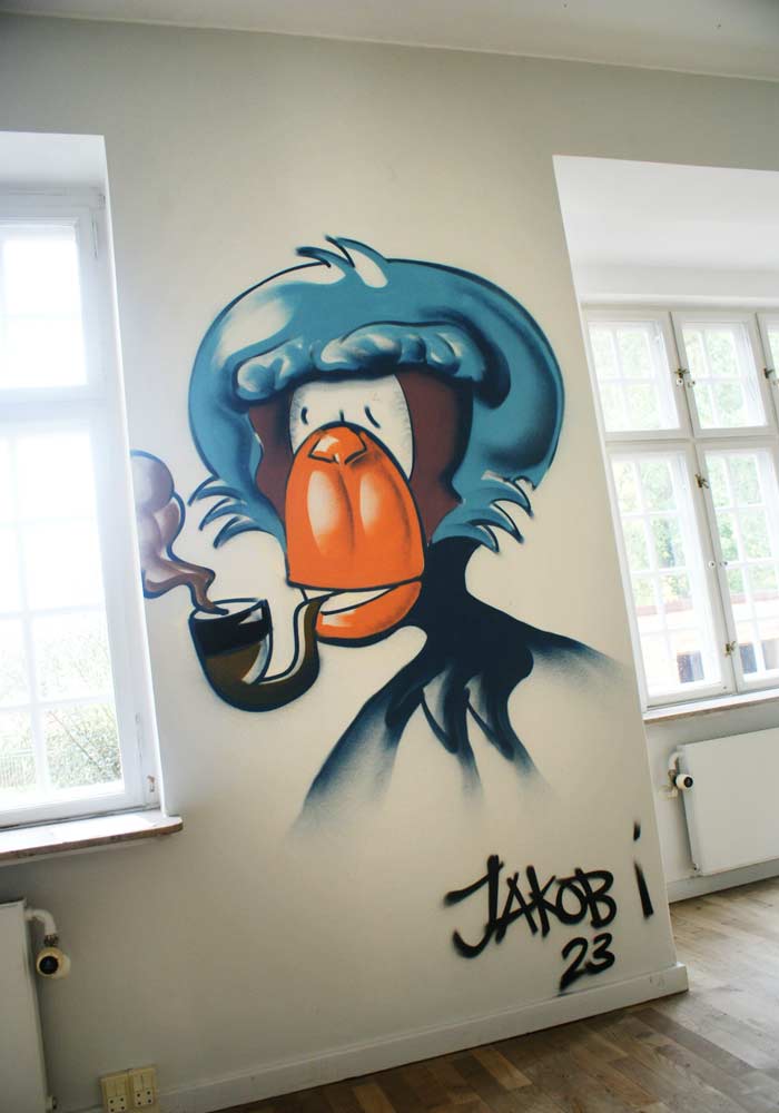 Abe med pibe malet som graffiti kunst